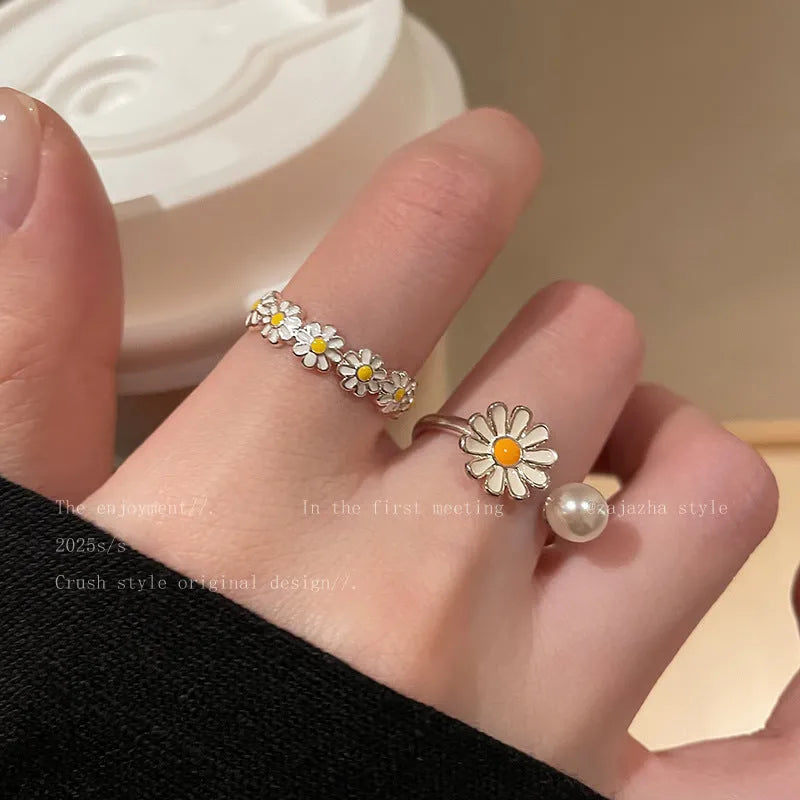 Women's copper opening ring with electroplated finish in daisy pearl and plain styles