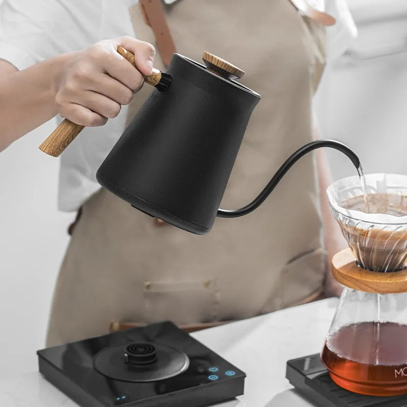 Intelligent temperature controlled hand brewed coffee pot in retro style, available in matte black or cream white, with UK electrical plug