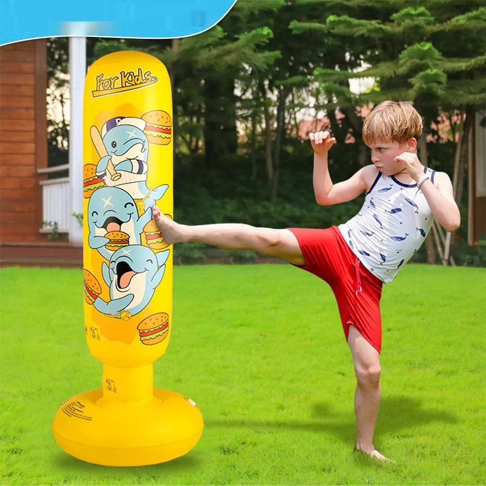 Tall yellow inflatable boxing column standing upright on a floor.
