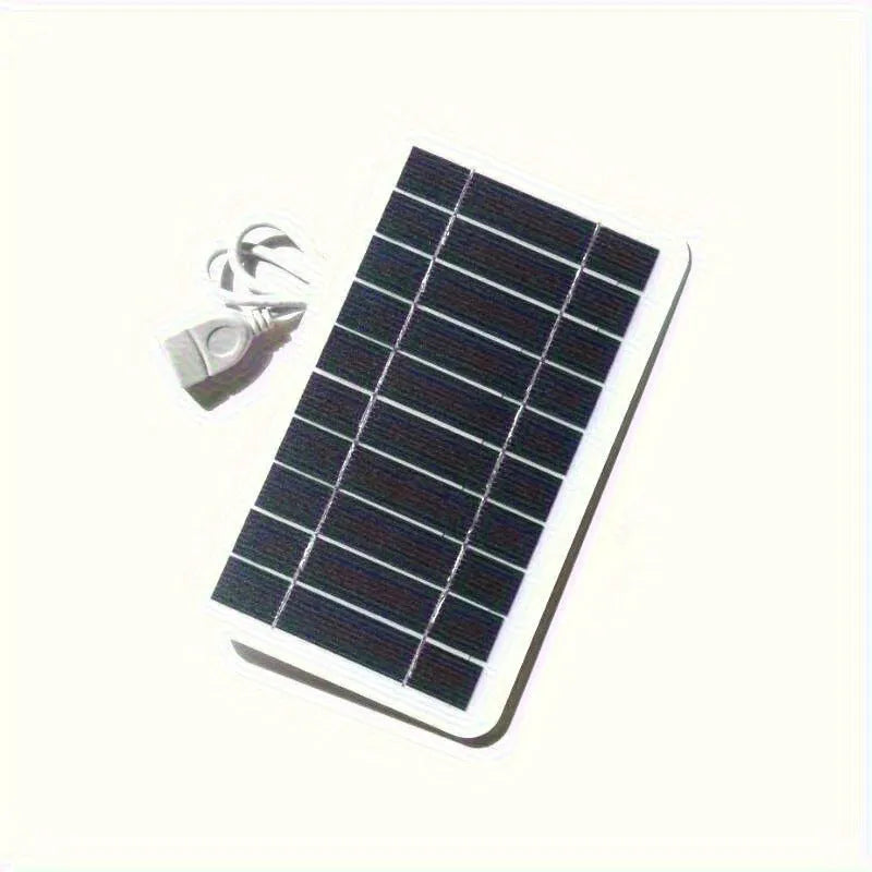 Portable 2W solar panel charger measuring 157x94mm with USB cable