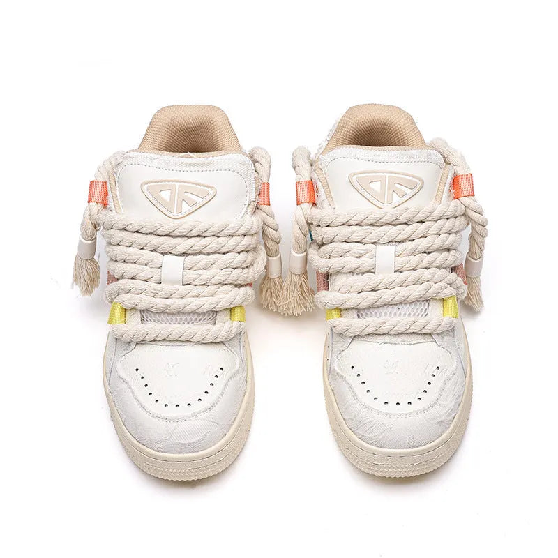 Creamy white retro skateboard shoes with lace-up front and low platform heel
