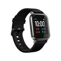 Black waterproof smart bracelet with touchscreen showing heart rate data on a silicone strap