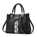 Snakeskin pattern large capacity shoulder bag in PU with zip closure, shown in khaki
