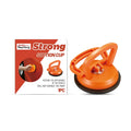 Strong suction cup unit with its separate metal puller tool on a smooth surface