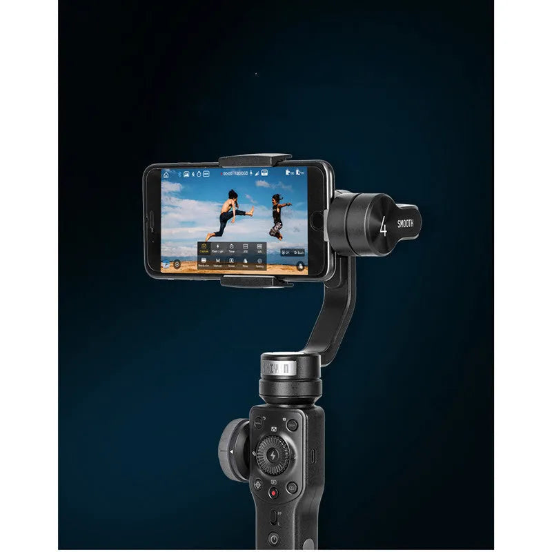 Black handheld mobile phone gimbal stabilizer on a table, made from ABS plastic.