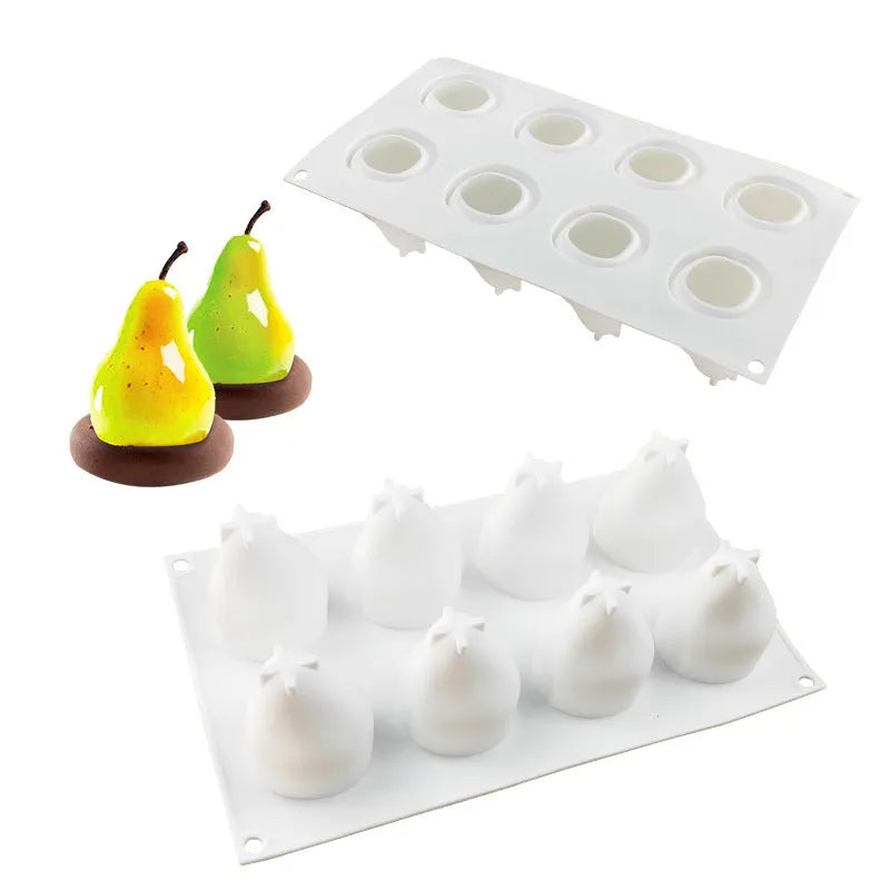 Six-cavity silicone baking mould with detailed pineapple, pine cone, and pear shapes for making Italian mousse.