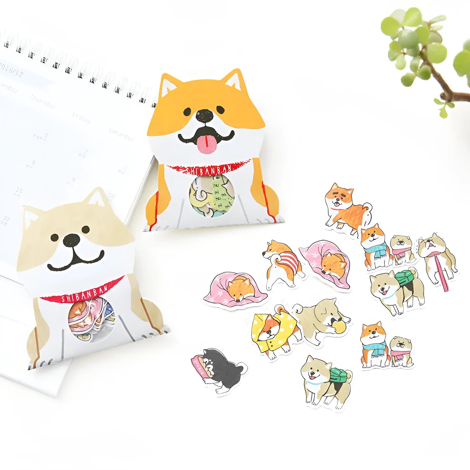 Dog decorative sticker pack showing 10 irregular shaped designs in black, light brown and orange colours for scrapbooking