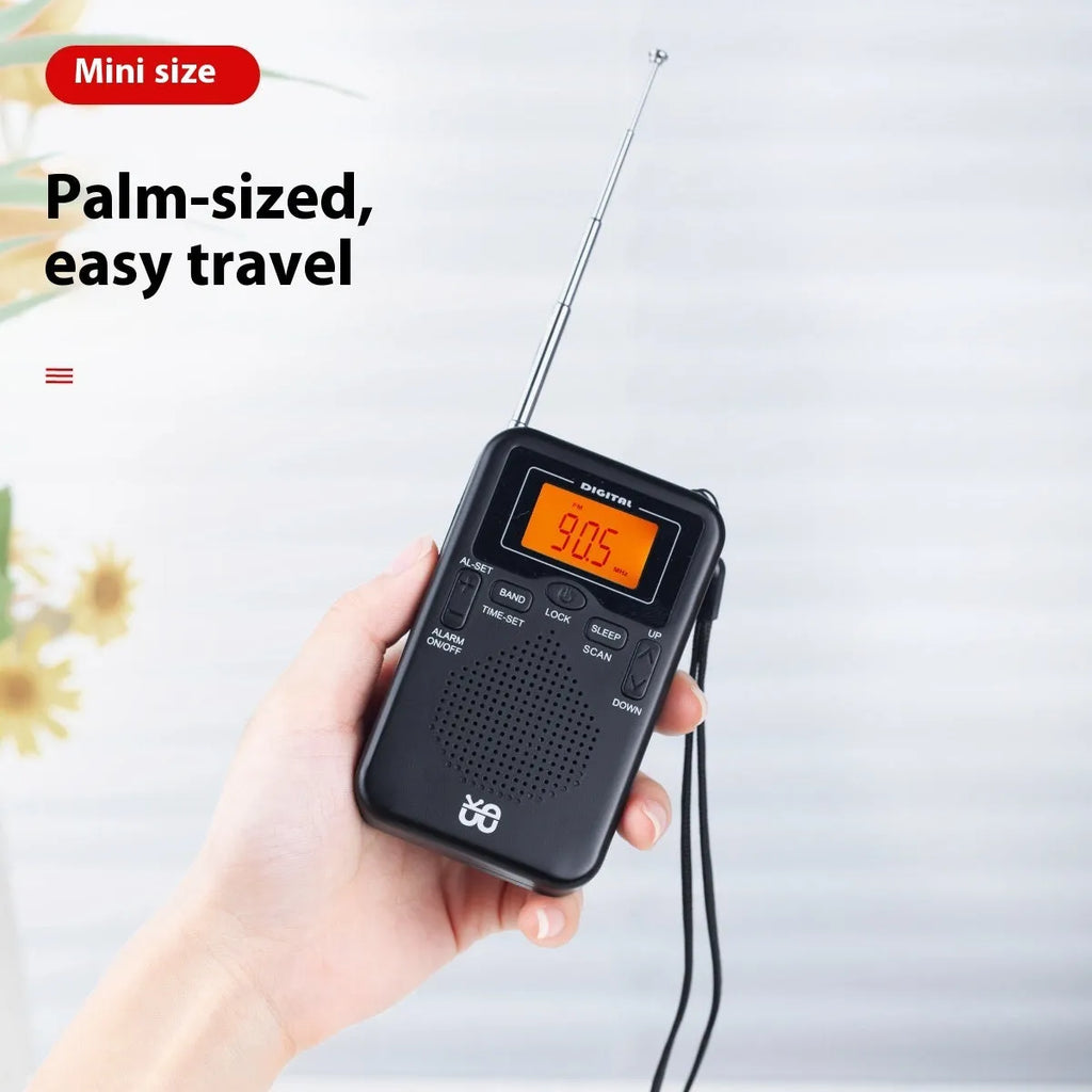 Portable pocket FM AM clock control stereo radio W-206 Black with digital display and built-in speaker on white background