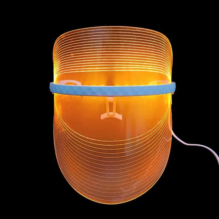 Transparent ABS LED light therapy face mask with red, blue, and yellow lights, 210x175x140mm, 83g, USB phone connection.