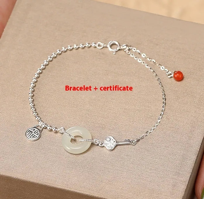 Women's Hetian jade bracelet with 925 silver peace buckle charm in traditional Chinese design