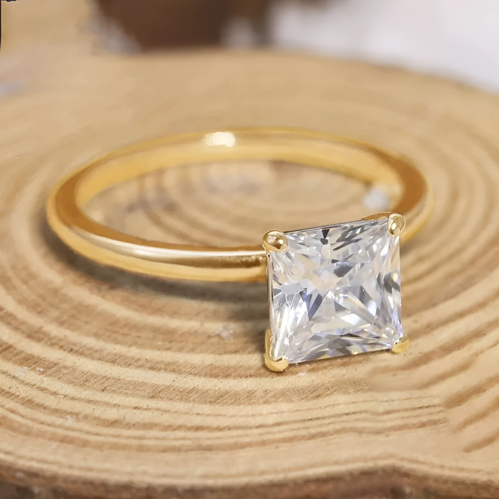 Sterling silver geometric women's ring with a round zirconia stone in silver, gold, or rose gold finish.
