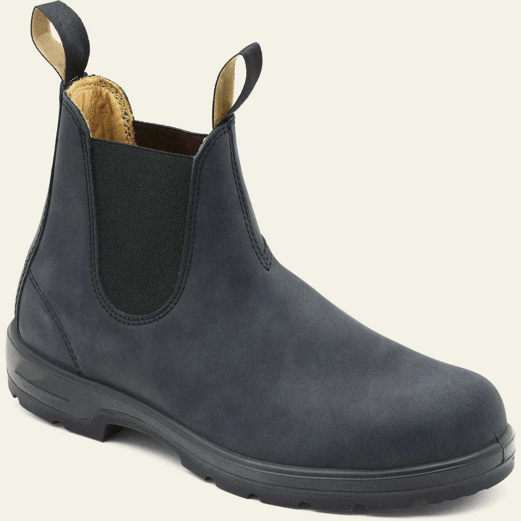 Vintage brown unisex Chelsea boots with car stitching and a low horse hoof heel.