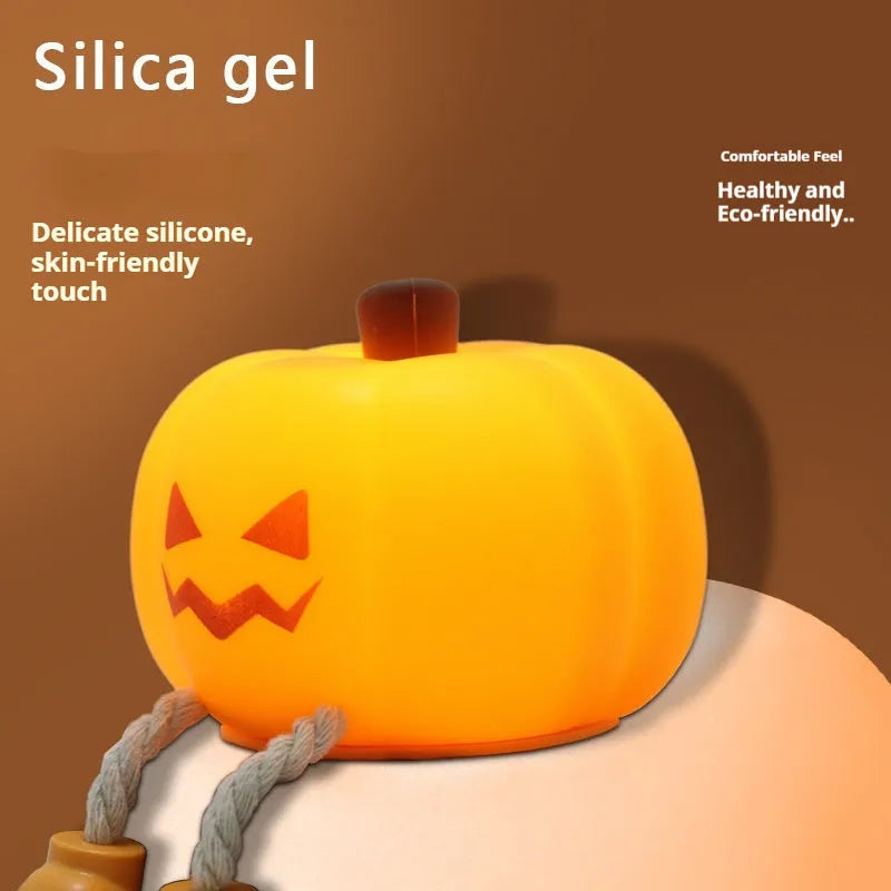 Orange pumpkin silicone night light with soft glowing illumination and touch controls