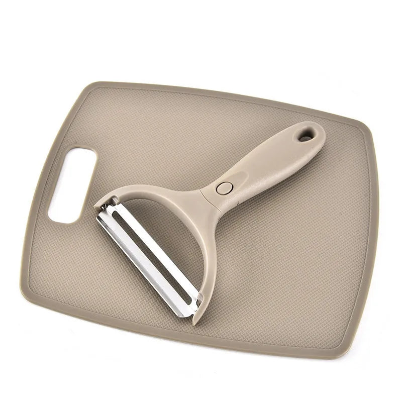 Green eight-piece disassemblable kitchen multi-planer set with stainless steel blade on a white background.