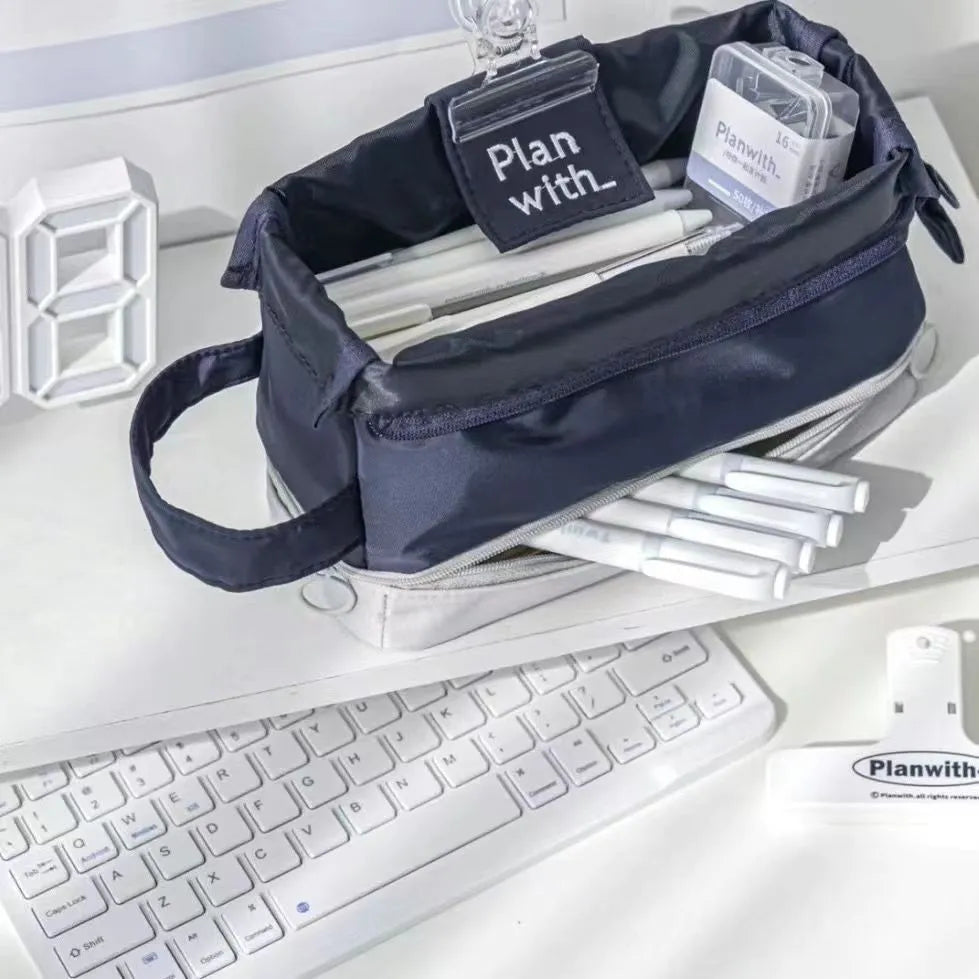 Double layer folding pencil case in polyester fabric showing navy blue, blue, and cream white colour options.