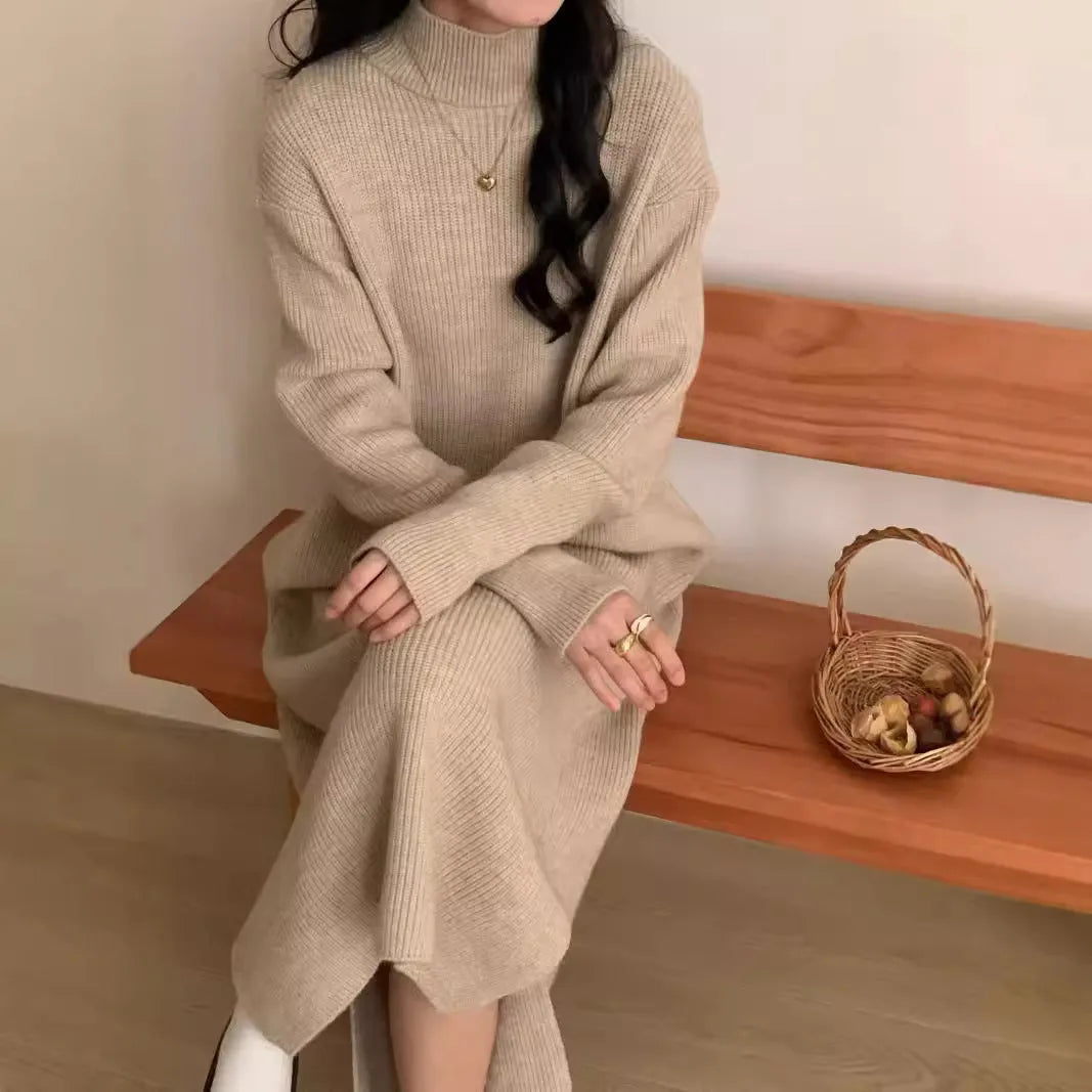 Acrylic knitted dress with half turtleneck, high waist, and midi length in solid colour