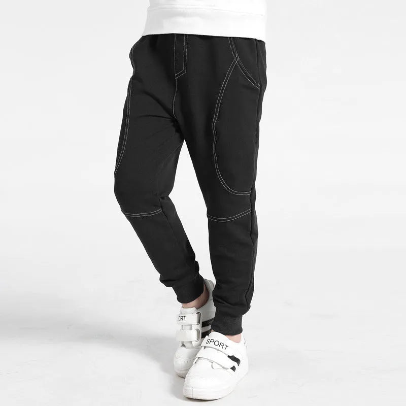 Boys' Korean-style sports trousers in black with elasticated waistband, sizes 120cm to 160cm