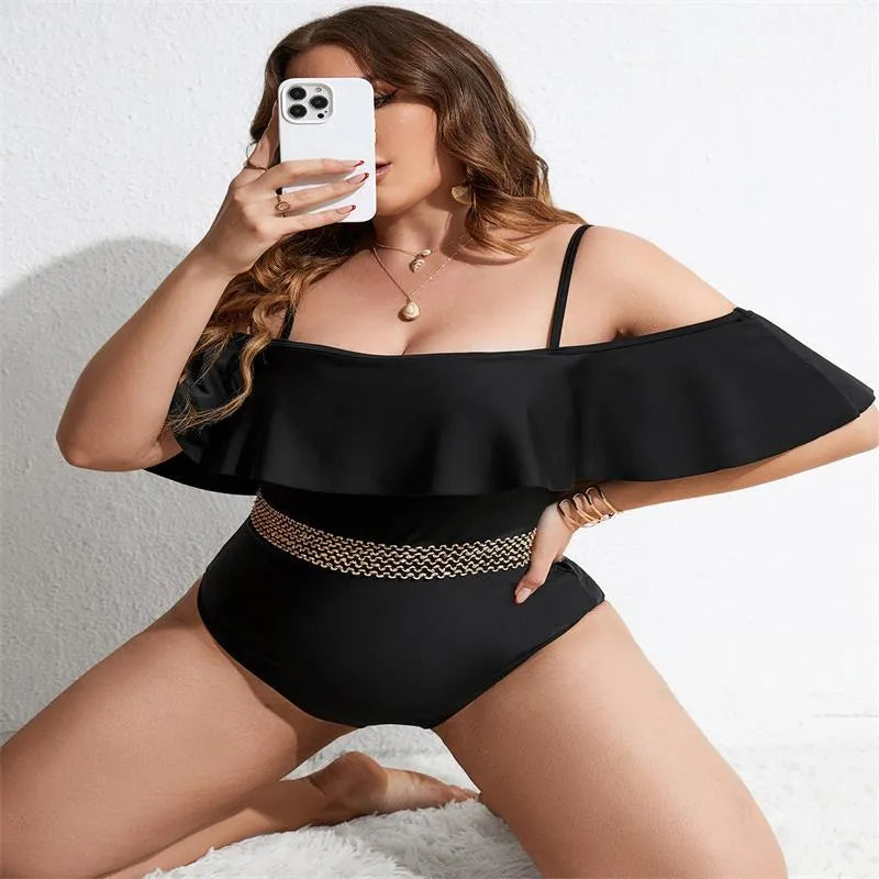 Black women's one-piece swimsuit shown in extended sizes