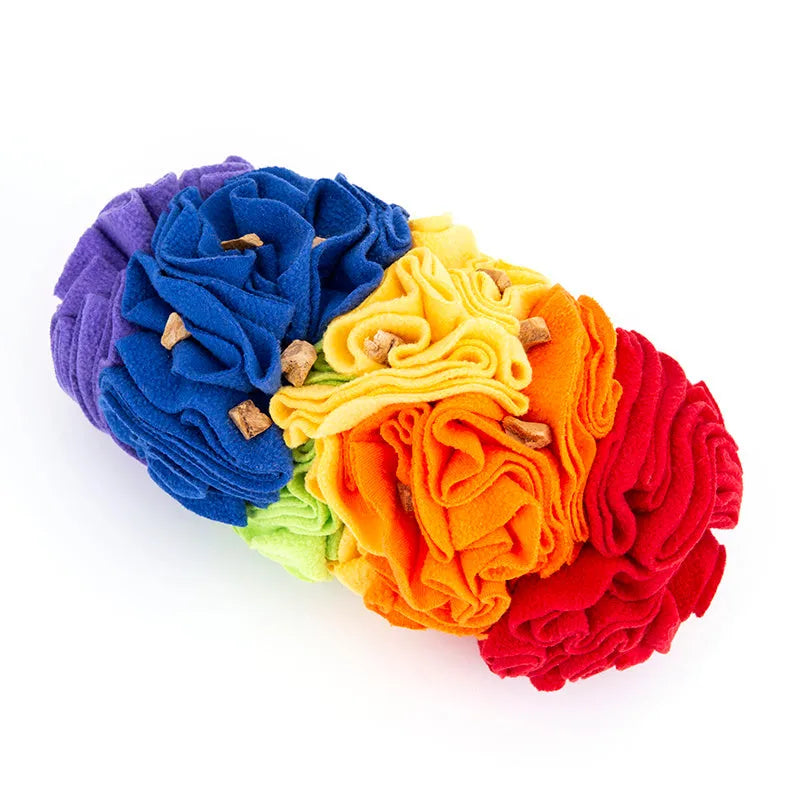 Dog snuffle pad in rainbow colour with polar fleece strips on a light background, 25x15cm size