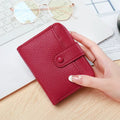 Ladies' short wallet with lychee pattern in pu leather, two-fold compact design
