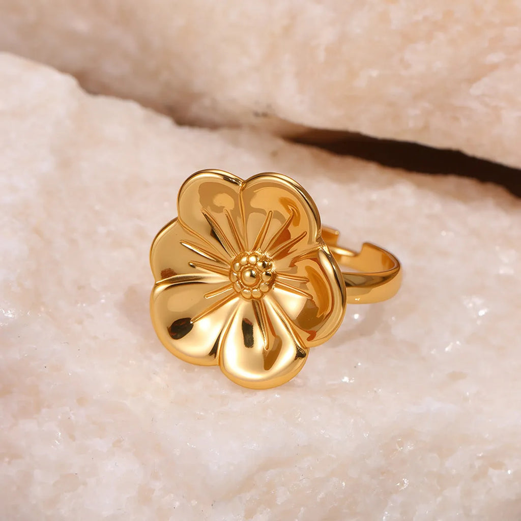 Stainless steel geometry pattern flower ring with open design for women in affordable luxury style