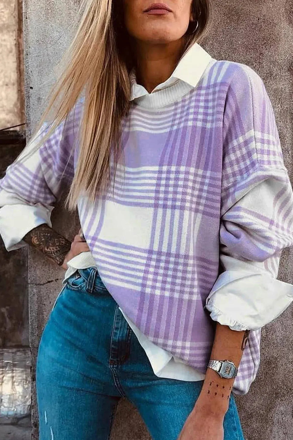 Lilac plaid print women's loose-fit long sleeve sweater with ribbed cuff and hem trim.