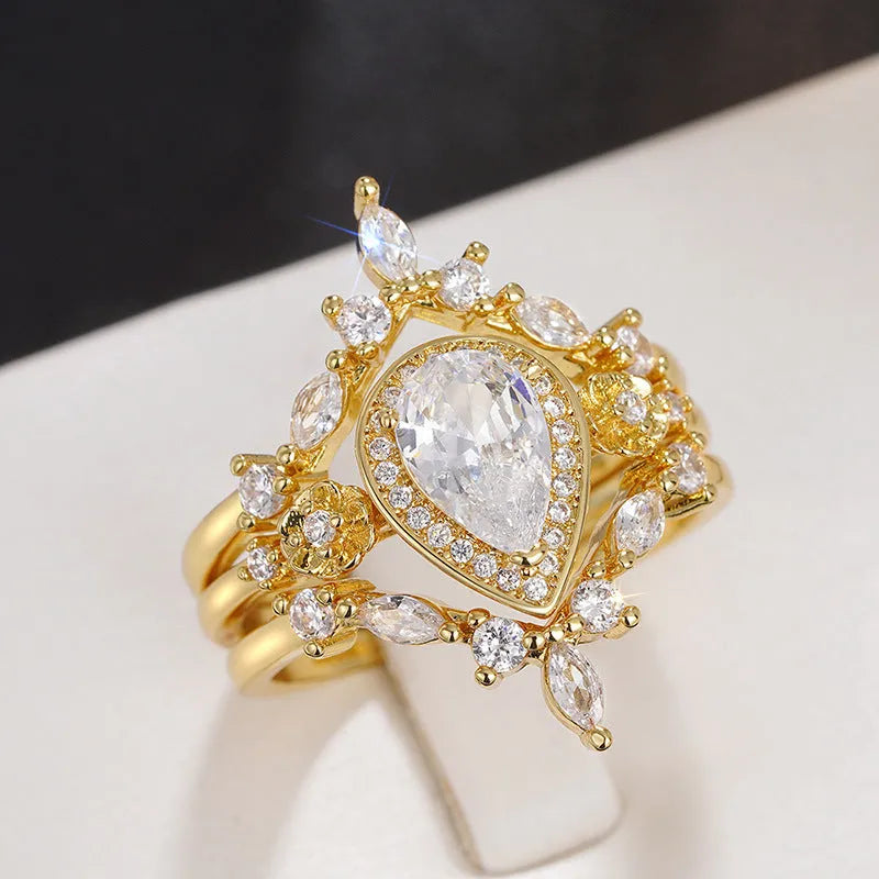Women's light luxury drop-shaped zircon ring in T0541 yellow gold finish, copper base, geometric water droplet design