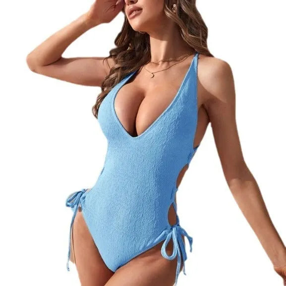 Women's black hollow backless tether one-piece bikini made from polyester fabric