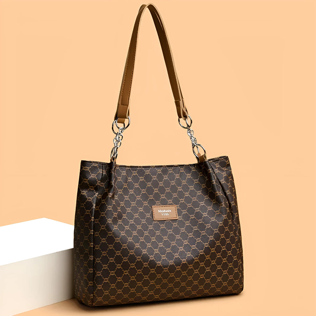 Women's retro fashion handbag in soft brown PU leather with shoulder strap.
