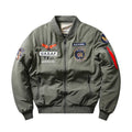Men's slim-fit stand collar cotton-padded coat in blue, shown with embroidery and patch pockets.