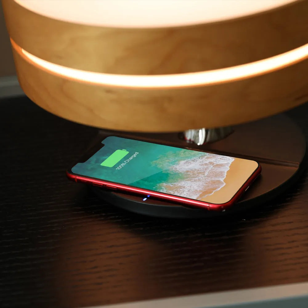 Round maple coloured ABS PC Bluetooth speaker LED lamp with wireless charging pad for living room
