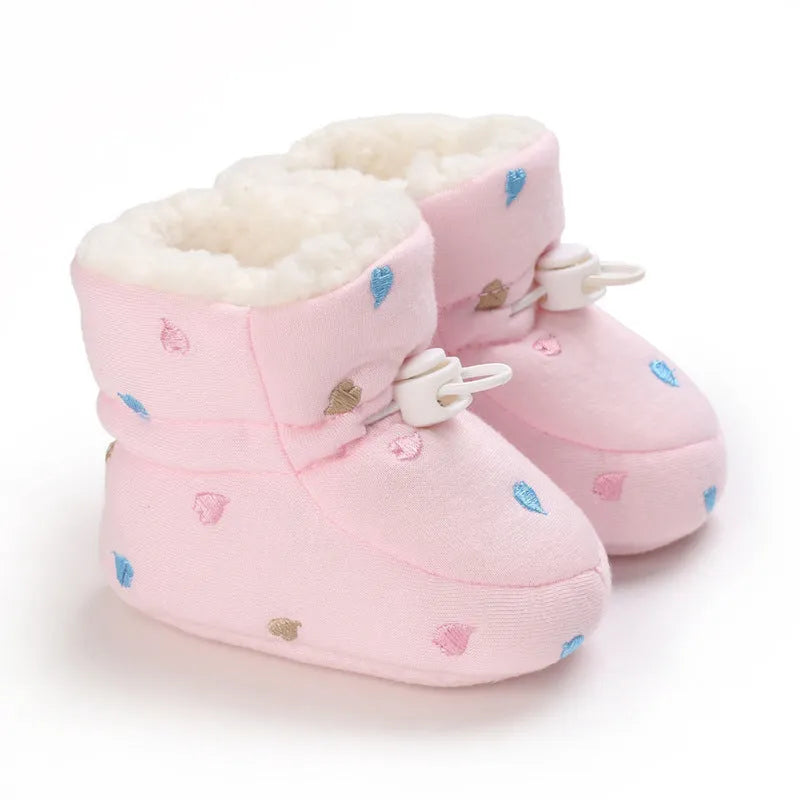 Baby autumn winter cotton shoes with tall crown, elastic band, non-slip sole, in black and white, dark blue, gray, or pink.
