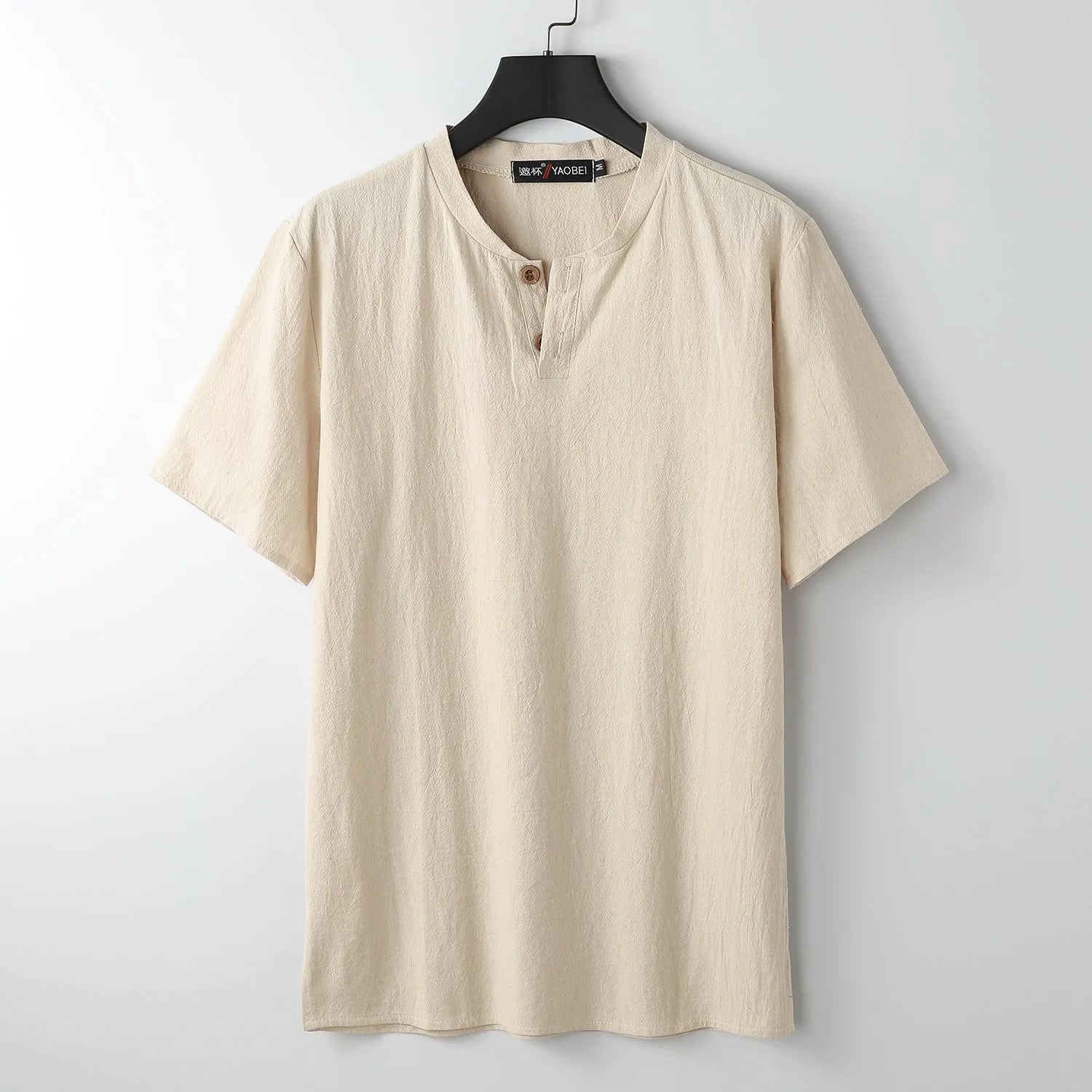 Women's loose fit cotton V-neck short sleeve top in apricot colour