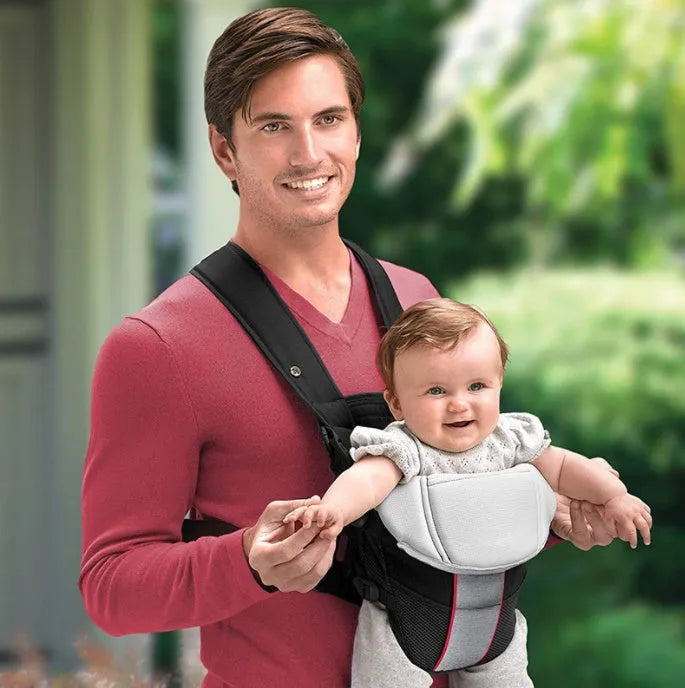 Double-shoulder baby carrier in blue colour showing infant facing carrying position