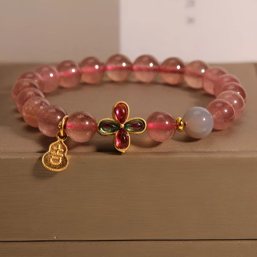 Natural strawberry quartz bracelet for women with four-leaf clover and calabash pendant on alloy chain with rhinestone accents