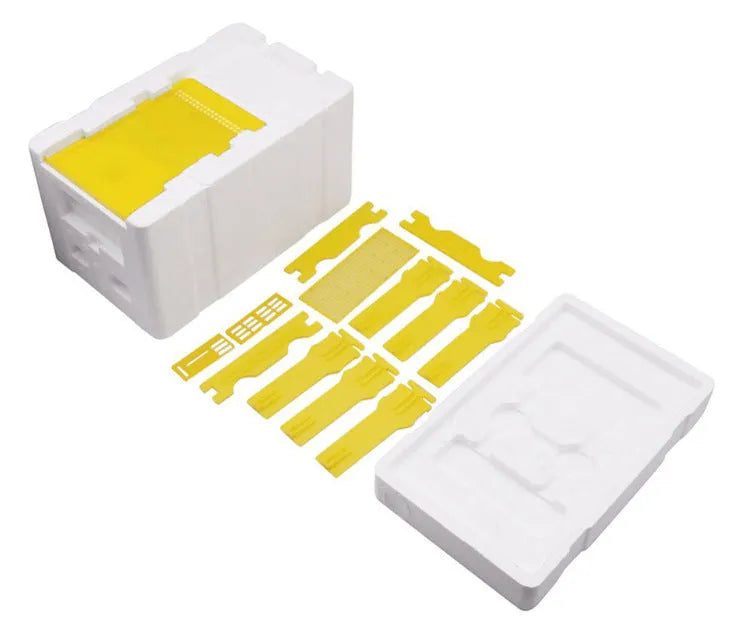 Set of three white EPS foam bee breeding boxes for hive management.