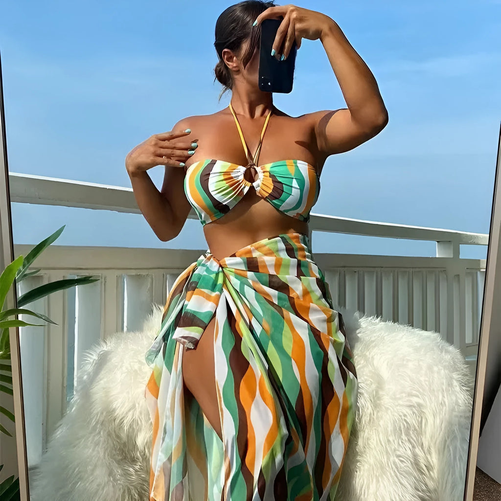 Women's printed bikini three-piece set with cover-up skirt in yellow green, magenta, or purple colours