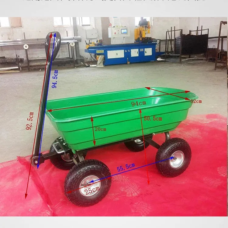 Green four-wheel plastic toy dump truck model TC2145 on a white background.
