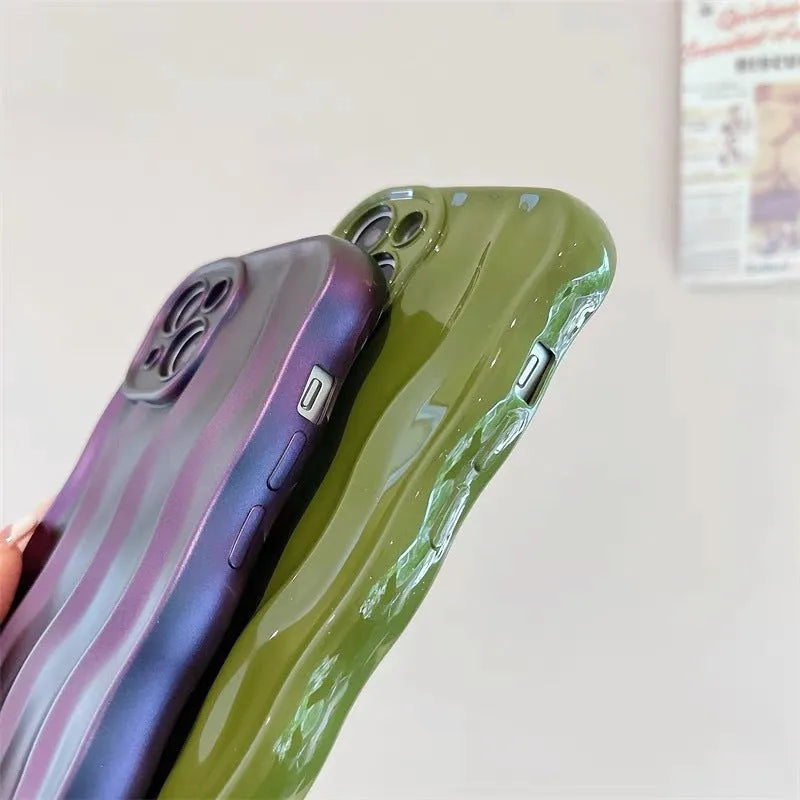 Solid-colour silicone iPhone case with a water ripple texture on the back.