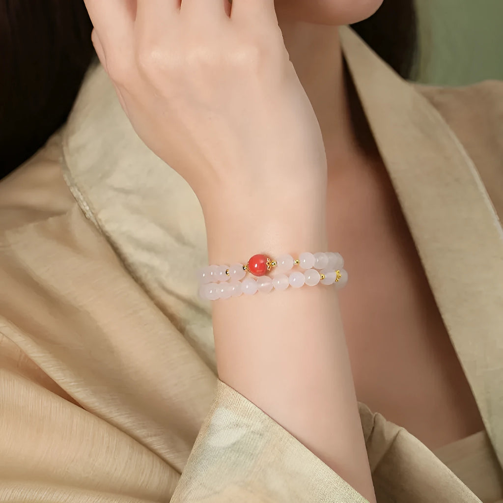 White agate women's bracelet with geometric double layer design featuring jequirity bean and cinnabar accents