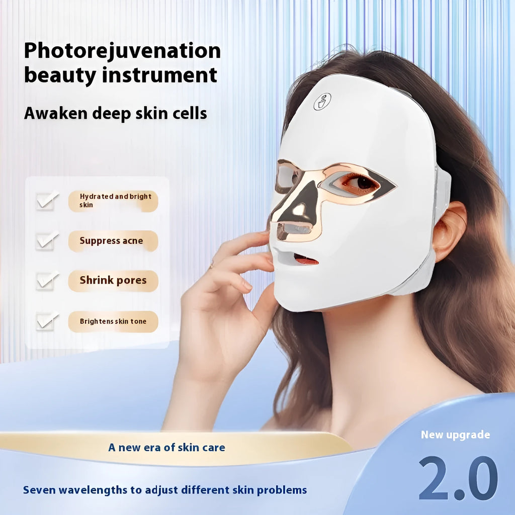 Rechargeable LED beauty mask with touch controls in white and black colour options on a table.