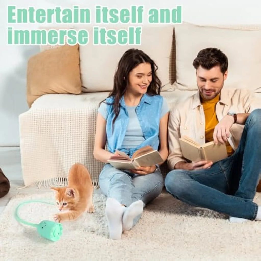 Green automatic cat toy with swinging silicone tails on 38cm wand for indoor feline play