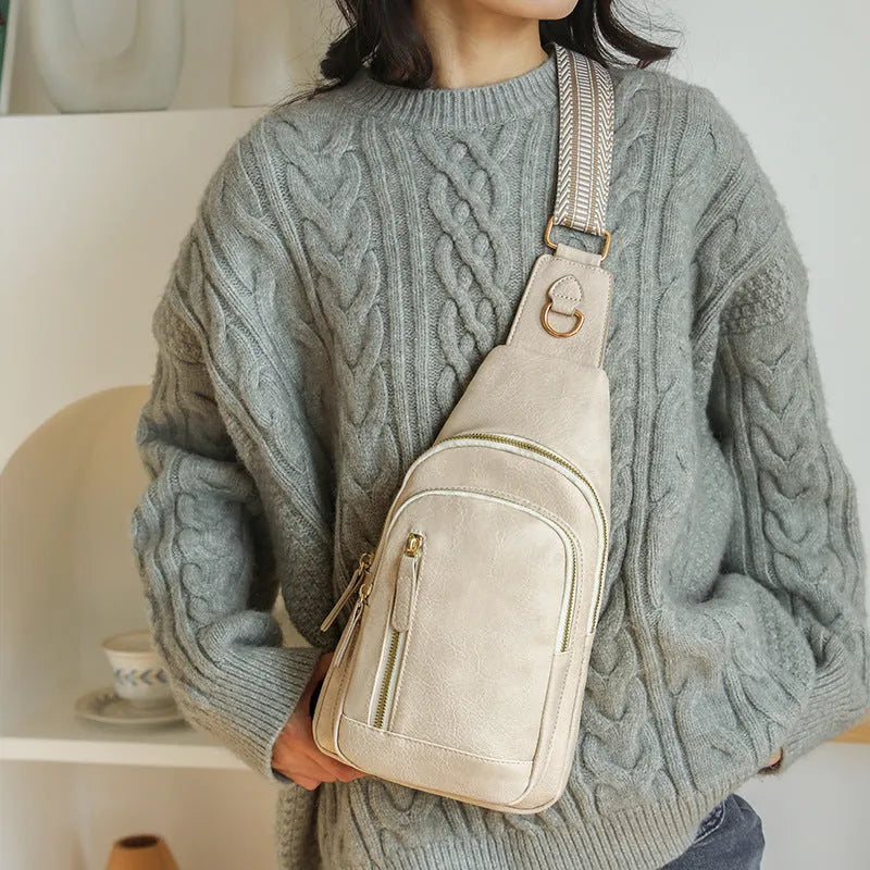 Soft brown PU leather women's crossbody messenger bag with an open front pocket.