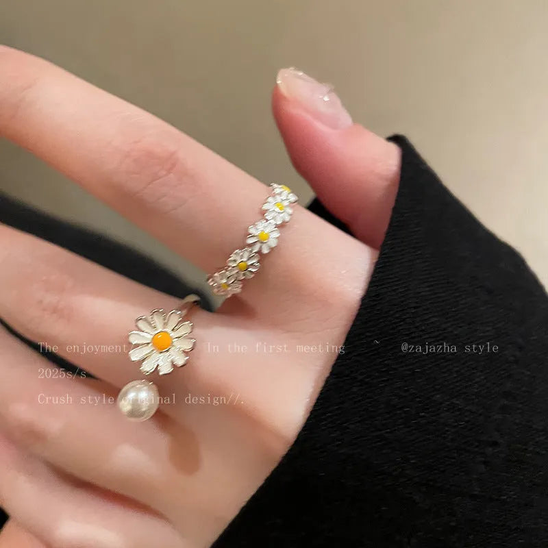 Women's copper opening ring with electroplated finish in daisy pearl and plain styles