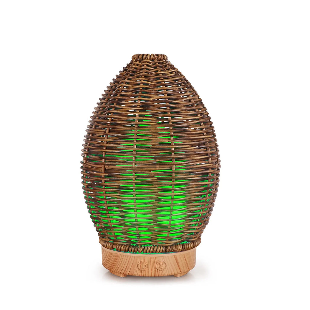 Hollow rattan aroma diffuser with light wood grain base, 100ml capacity for essential oils