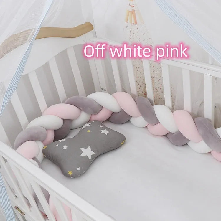 Spandex crystal velvet baby cot bumper in grey pink colour, shown flexible and long.