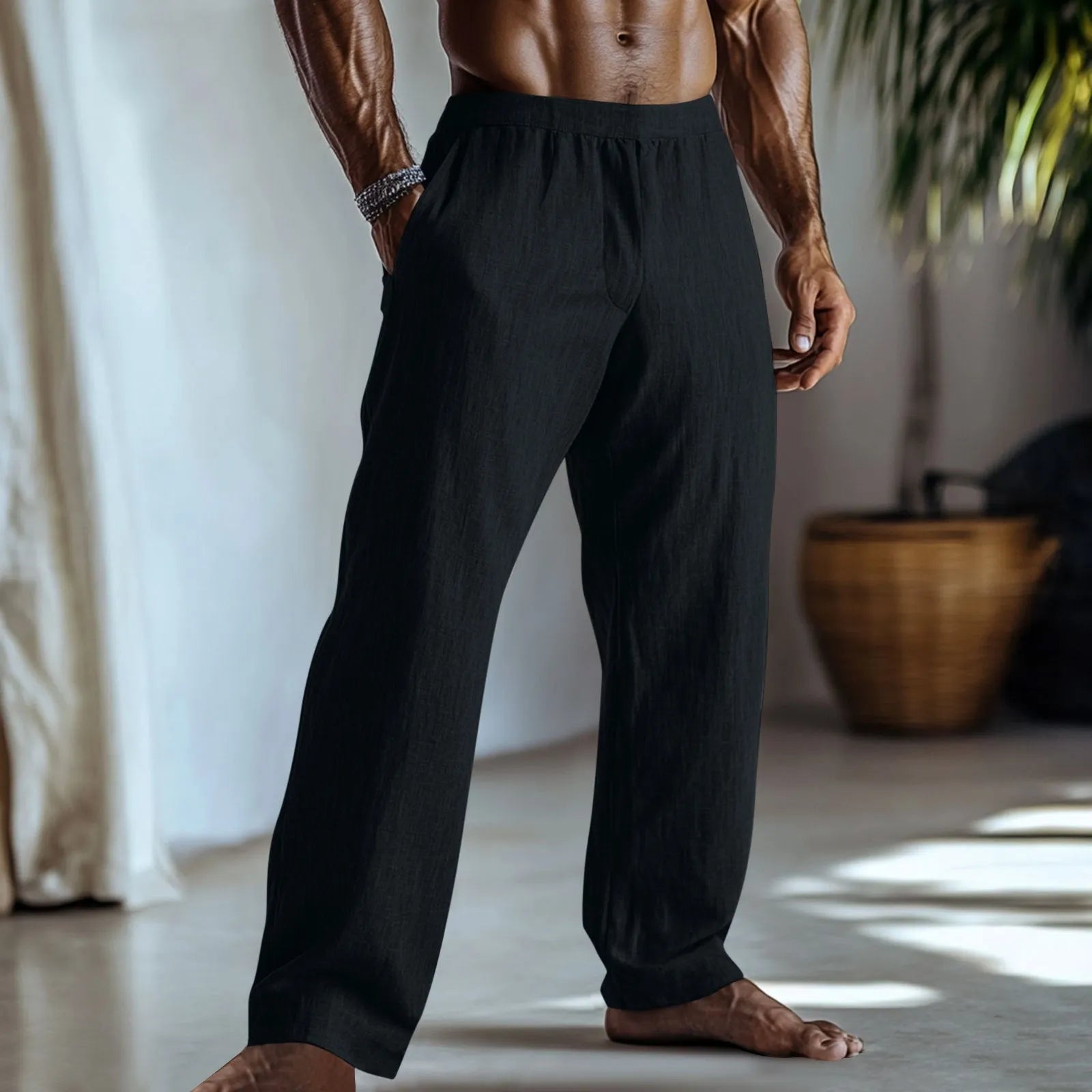 Straight leg casual trousers in cotton and linen fabric, shown in light green colour with side pockets.