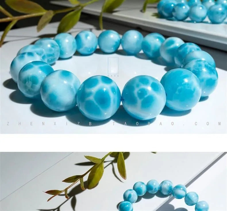 Blue handmade Bodhi bracelet with natural crystal stones and pearl accents in Maillard style.
