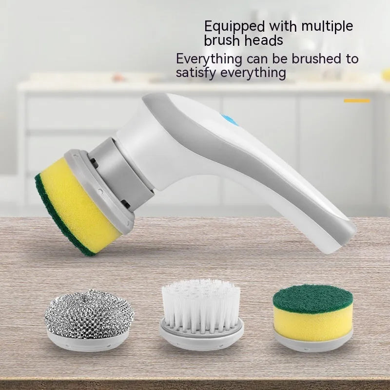 White cordless electric spinning cleaning brush with multiple brush heads on wall bracket
