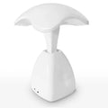 White modern LED desk lamp with plastic shade and touch controls on wooden desk
